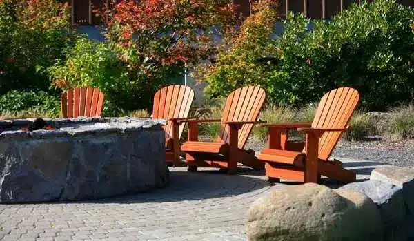 In-Ground Fire Pit With Classic Adirondack Chairs